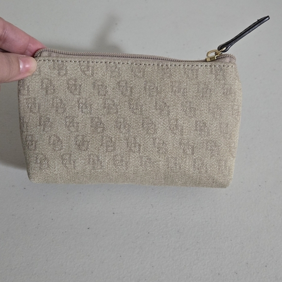 Handbags - Dooney and Borke Mini Canvas Beige Monogram Leather Pull Pouch